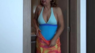 58-Year-Old Latina Wife Shows Off In Swimsuit On The Beach