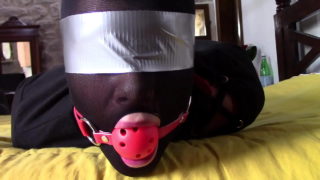 Laura Xxx Is Wearing Panthyhose And High Heels. She’s Hogtied, Masked, Blindfolded And Ballgagged