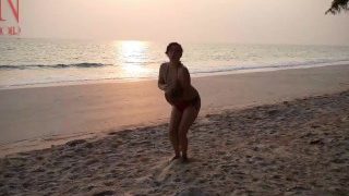 Nice Lady At Lonely Nudist Beach. Red Swimsuit. Red Bikini.